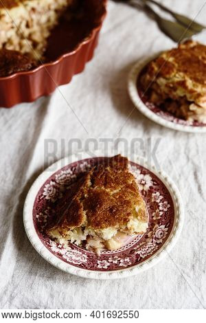 Apple And Cheese Cobbler Crisp. Cobbler Or Crumble Dessert With Apples In Ceramic Baking Form On Bei