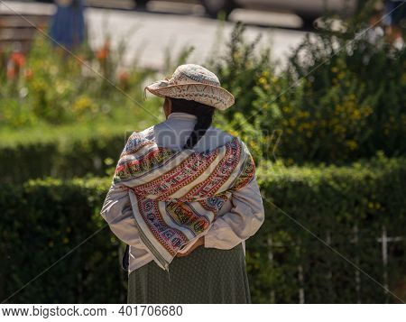 Old Woman In Andes Mountains Town Village Achoma Wearing Traditional Indigenous Handwoven Colorful C