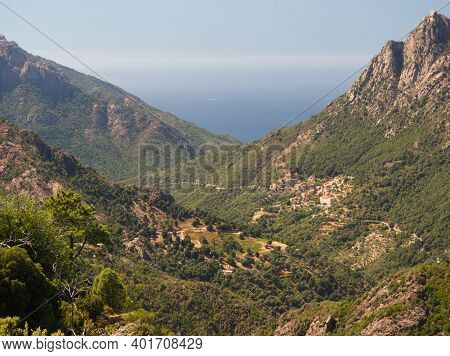 Panorama Of Rocks And Forests From Aiton Forest In The Mountains Under The Blue Sky Of Corsica