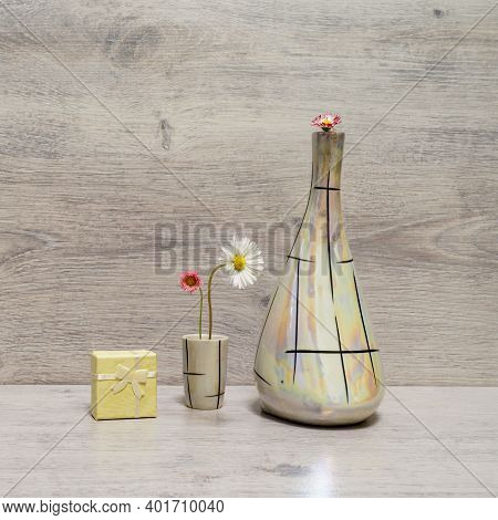 Summer Creative Still Life In Minimal Style. White And Pink Marguerite Daisy Flowers In Vintage Pear