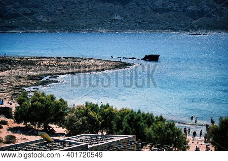 Rusty Shipwreck Off The Island Of Imeri Gramvousa, Crete, Greece On Mediterranean Sea During Summer