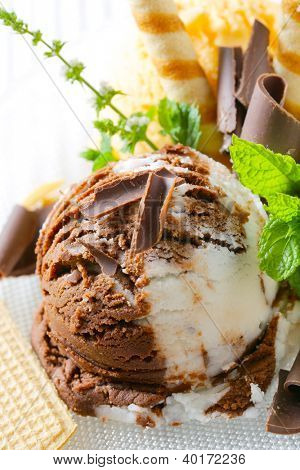 Stracciatella ice cream dessert decorated pieces of chocolate