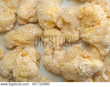 Pile Of Raw Breaded Cauliflower Top View Closeup