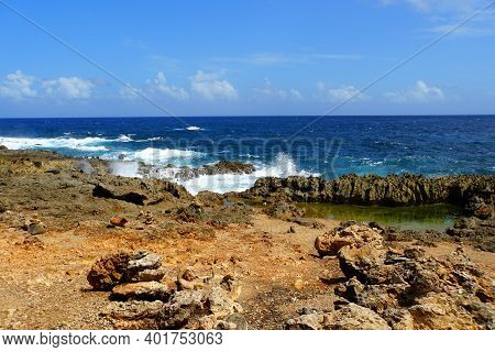 Rocky Cliffs With Rough Waves At Andicuri Beach, Aruba