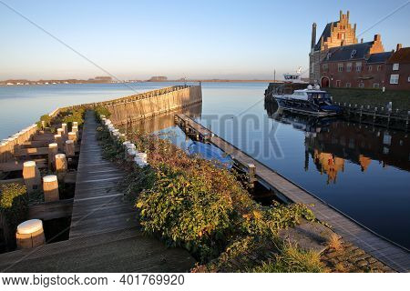 Reflections Of Campveerse Toren At Sunset In Veere, Zeeland, Netherlands