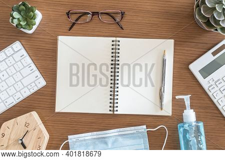 Notebook Open Blank Note Book Paper Page In New Normal Lifestyle, Work At Home With Hand Sanitizer, 