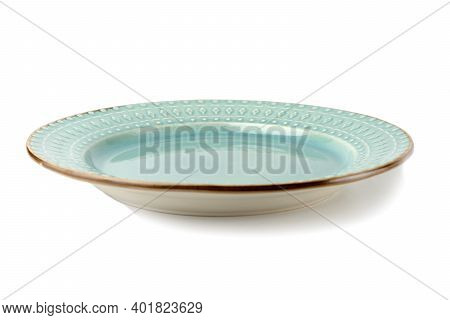 Empty Ceramic Plate Of Delicate Bed Aquamarine Turquoise Color With A Gold Border Isolated On A Whit