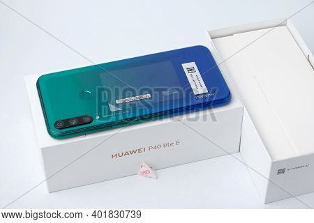 St. Petersburg, Russia, December 23, 2020: Unpacking New Products From Huawei, Huawei P40 Lite E Sma