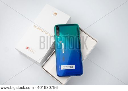 St. Petersburg, Russia, December 23, 2020: Unpacking New Products From Huawei, Huawei P40 Lite E Sma