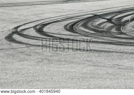 The Rubber Tracks From The Rallye Cars Left On The Tarmac In The Hairpin.