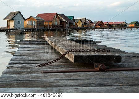 A Picture From Hungary, From A Place Called Bokod. The Local People Have The Wooden Cottages On Pylo