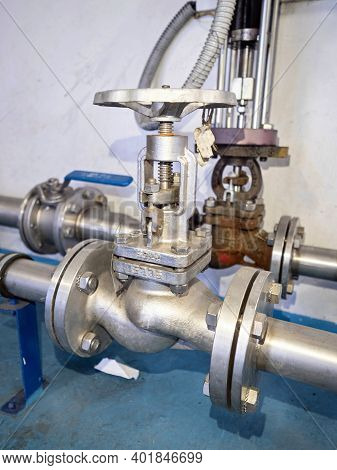 Stainless Stopcock Valve On Stainless Gas Pipeline Branch. Cables To Sensor In Gas Pipeline. Industr