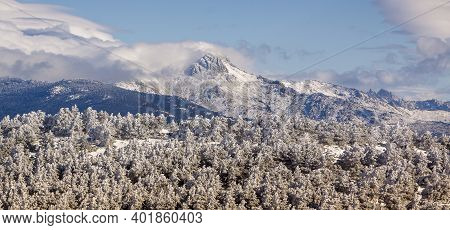 Snowy Landscape Of The Sierra De Guadarrama, Between Madrid And Segovia. Panoramic With Frozen Fores
