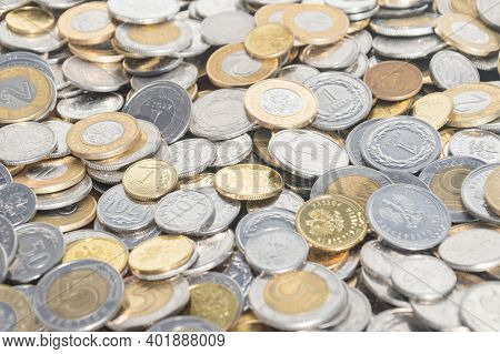 Lots Of Pln, Polish Zloty Coins As Background.