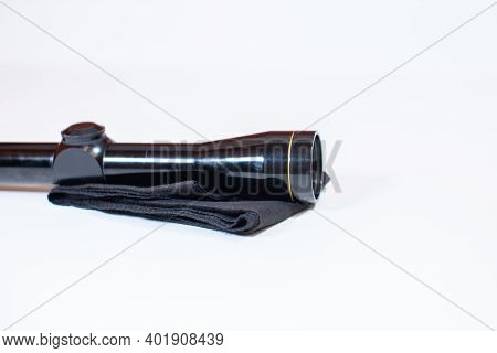 A Compact, 3x9 Magnification Scope Sits On A White Background, Ready To Be Mounted On A Rifle To Hel