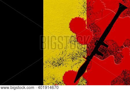 Belgium Flag And Black Rpg-7 Rocket-propelled Grenade Launcher In Red Blood. Concept For Terror Atta