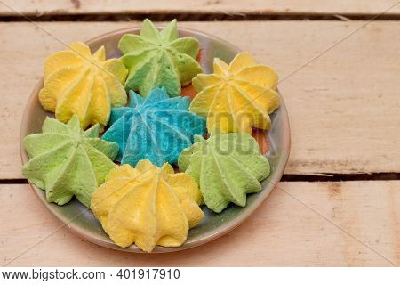 Sweet, Crispy, Multi-colored Meringue In A Plate.