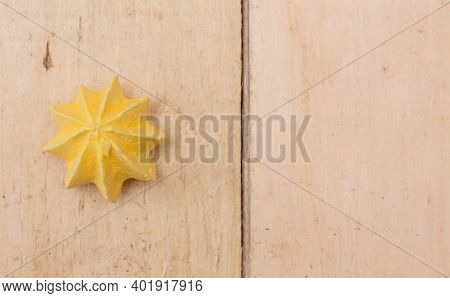 Yellow, Sweet, Crispy Meringue On A Wooden Background.