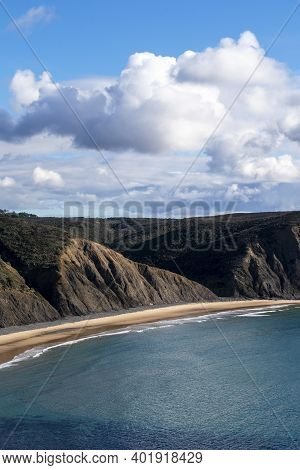Beautiful Scenic Wild Coastline Seascape, An Empty Beach And The Cliffs Inside An Natural Park. No W