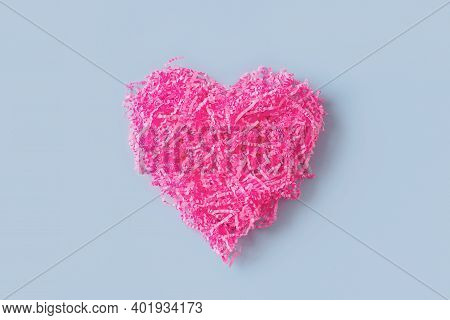 Shape Of Pink Heart Like Tangle Of Packaging Material, Greeting Card On Blue Background, Flat Lay