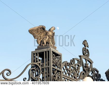 A Large Decorative Metal Eagle With Outstretched Wings On The Gate Of The Upper Terrace Of The Bahai