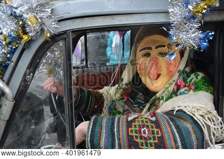 Malanka_ Man In A Festive Costume And Mask In Car