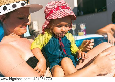 Summer Sun With Child Concept. Baby With Mother In Summer Sun Lifestyle