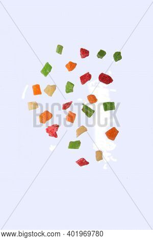 Pouring Succades Isolated On White Background. Concept Of Flying Food. Image Contains Copy Space