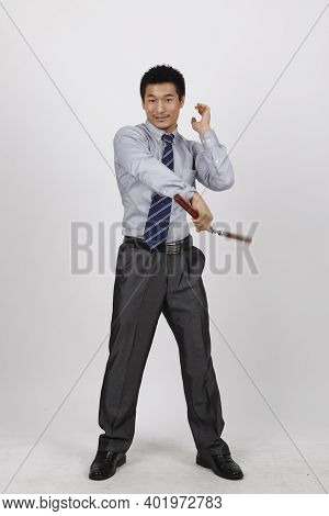 A Business Man With A Double Stick High Quality Photo