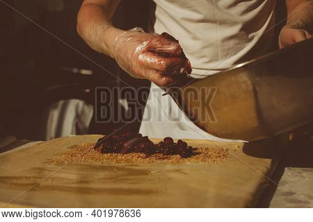 Ingredients For Baking Strudel Stuffed With Canned Cherries. The Cook Is Preparing A Cherry Strudel.