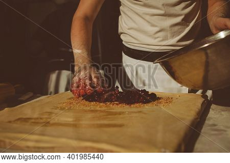 Ingredients For Baking Strudel Stuffed With Canned Cherries. The Cook Is Preparing A Cherry Strudel.