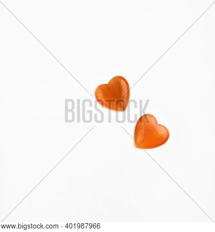 Orange Hearts For Valentine\'s Day. Cabochon Heart Isolated On White Background. Stone Cabochon From