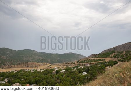 The Village Of Morskoe In The Valley Of The Mountains In The Eastern Part Of Crimea
