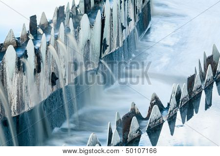 Close-up Of Sewer Overflowing From Round Settlers, Long Exposure
