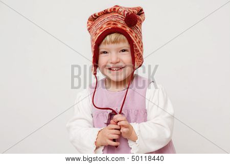 Little Girl Wearing A Hat