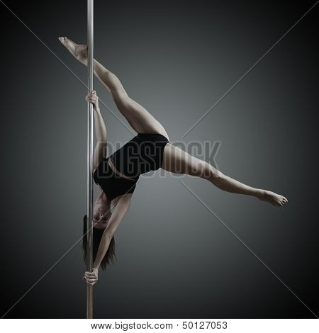 pole dancer, young woman dancing on pylon, toned and noise added