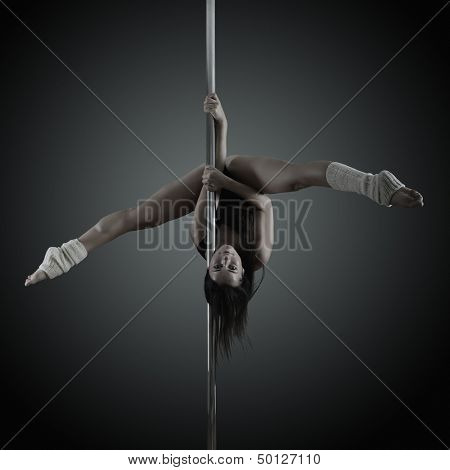 pole dancer, young woman dancing on pylon, toned and noise added