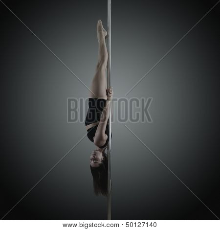 pole dancer, young woman dancing on pylon, toned and noise added