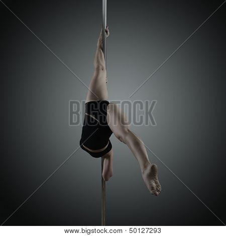 pole dancer, young woman dancing on pylon, toned and noise added