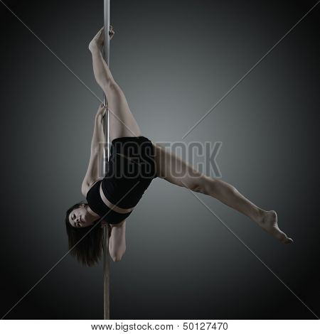 pole dancer, young woman dancing on pylon, toned and noise added