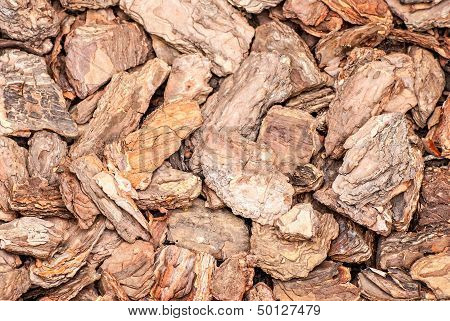 Background Of Pine Bark Nuggets Layer Used For Gardening