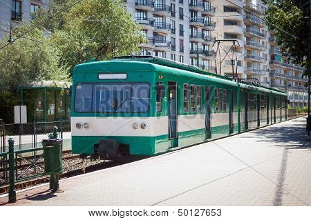 Green Suburb Train Waiting On A Staition In Budapest