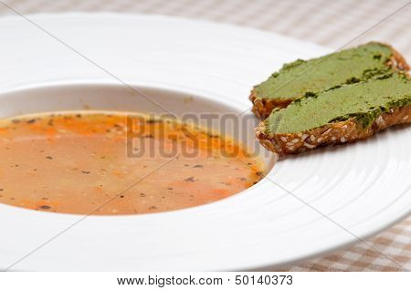 Italian Minestrone Soup With Pesto Crostini On Side