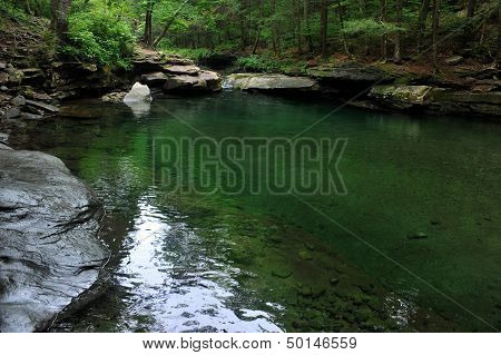 Mountain river with blue green water at Catskils mountains upstate NY