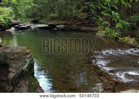 Mountain river with blue clean water and stones at Catskils mountains upstate NY