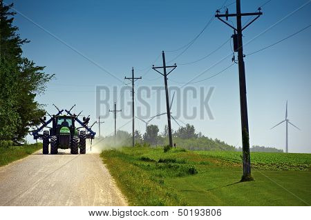 Farmer On Suburb Road