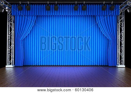 Theater stage with blue curtains and spotlights
