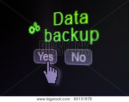 Data concept: Gears icon and Data Backup on digital computer screen