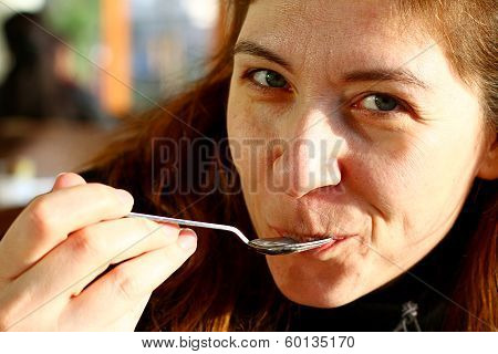 Young Turkish Women Tasting Sweet Desert