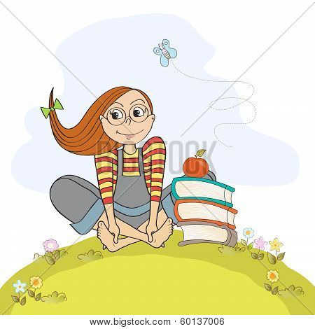 Studious Girl Sitting Barefoot In The Grass